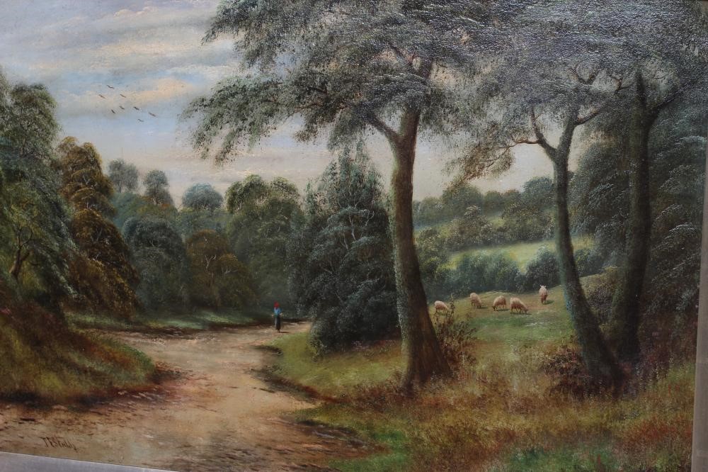 BRITISH SCHOOL (Late 19th Century) Figure on a Woodland Track, signed lower left, oil on canvas, 20 Image