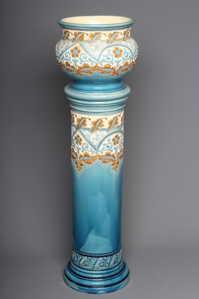 A BURMANTOFTS FAIENCE SMALL JARDINIERE AND STAND moulded and impressed with stylised flowers Image