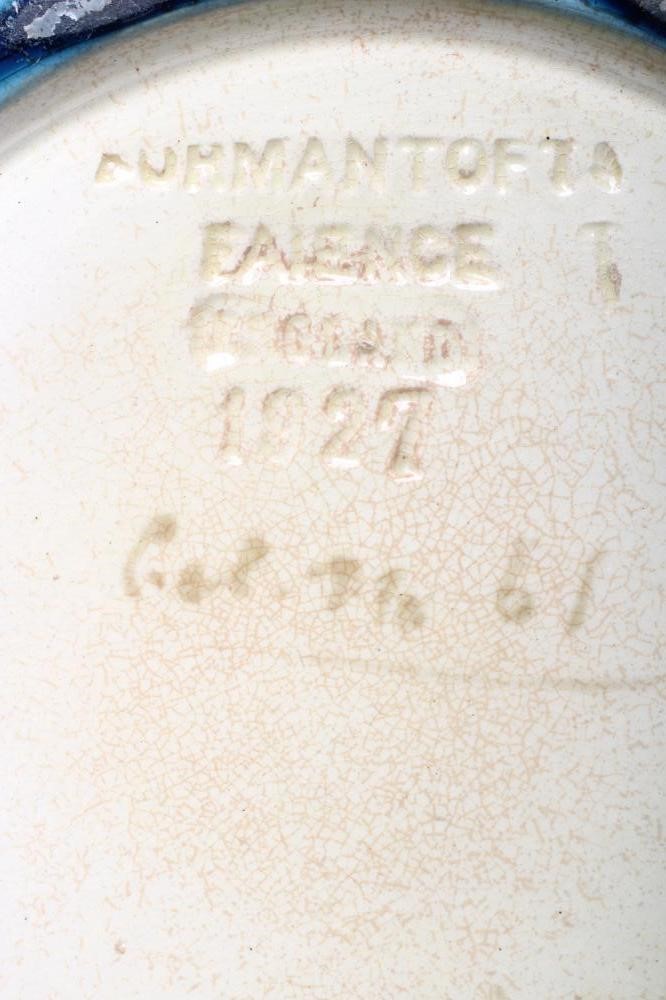 A BURMANTOFTS FAIENCE SMALL JARDINIERE AND STAND moulded and impressed with stylised flowers Image
