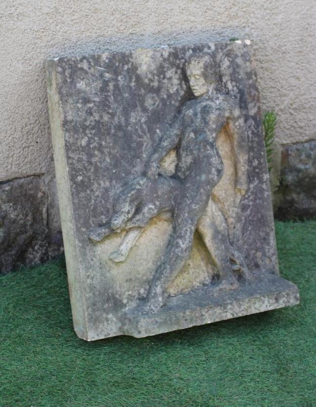 A SANDSTONE PLAQUE OF DIANA THE HUNTRESS, carved in high relief with the goddess walking and Image