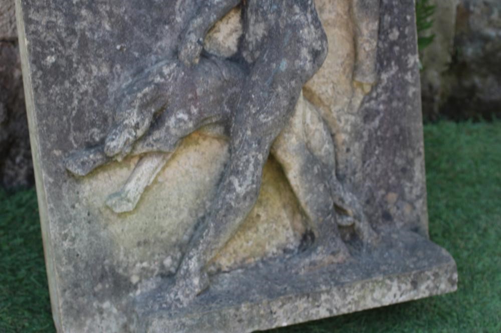 A SANDSTONE PLAQUE OF DIANA THE HUNTRESS, carved in high relief with the goddess walking and Image
