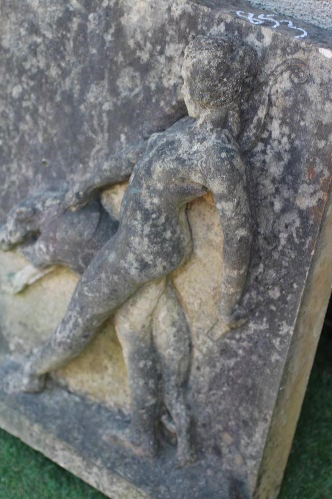 A SANDSTONE PLAQUE OF DIANA THE HUNTRESS, carved in high relief with the goddess walking and Image