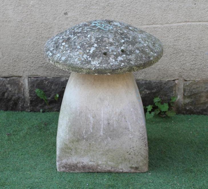 A CAST STONE STADDLE STONE of typical form with square tapering stem, 21 1/2" w x 26 1/2" h (Est. Image
