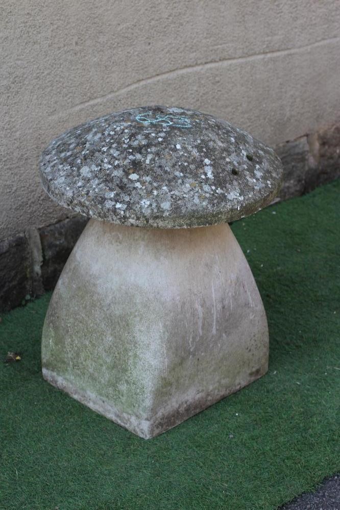 A CAST STONE STADDLE STONE of typical form with square tapering stem, 21 1/2" w x 26 1/2" h (Est. Image