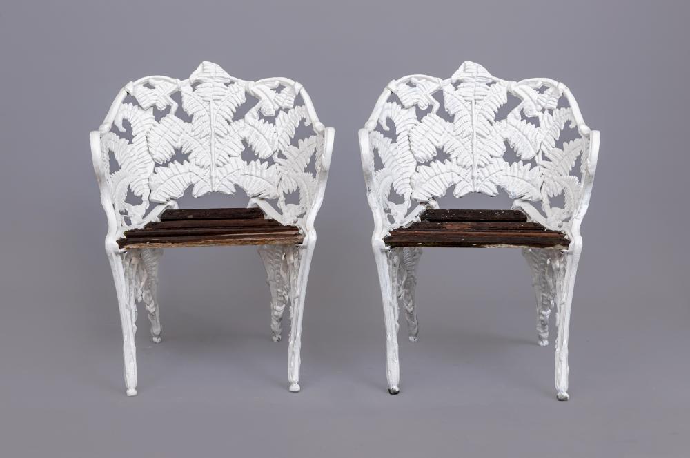 A PAIR OF CAST IRON COALBROOKDALE FERN & BLACKBERRY PATTERN ARMCHAIRS Image