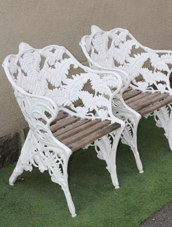 A PAIR OF CAST IRON COALBROOKDALE FERN & BLACKBERRY PATTERN ARMCHAIRS Image