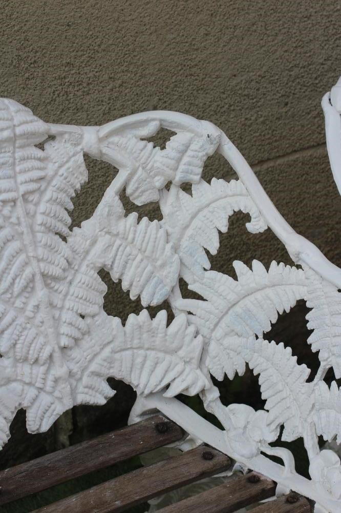 A PAIR OF CAST IRON COALBROOKDALE FERN & BLACKBERRY PATTERN ARMCHAIRS Image