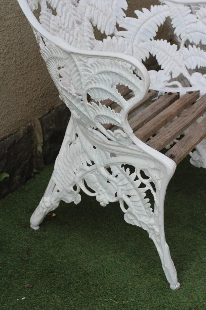 A PAIR OF CAST IRON COALBROOKDALE FERN & BLACKBERRY PATTERN ARMCHAIRS Image