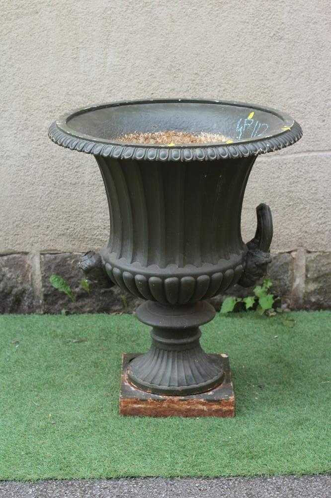A VICTORIAN CAST IRON URN, late 19th century, of fluted campana form with ovolo rim, reeded mask Image