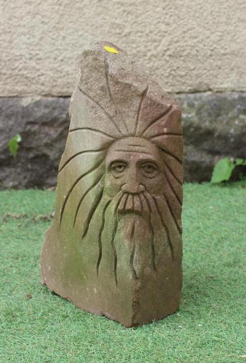 A HAND CARVED RED SANDSTONE CORBEL depicting a bearded male figure, 9" w x 8" d x 17" h (Est. plus Image