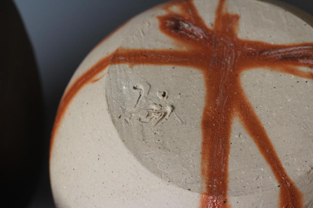 THREE BIZEN STONEWARE TOKKURI, one with a hidasuki firing, various incised marks, one possibly by Image