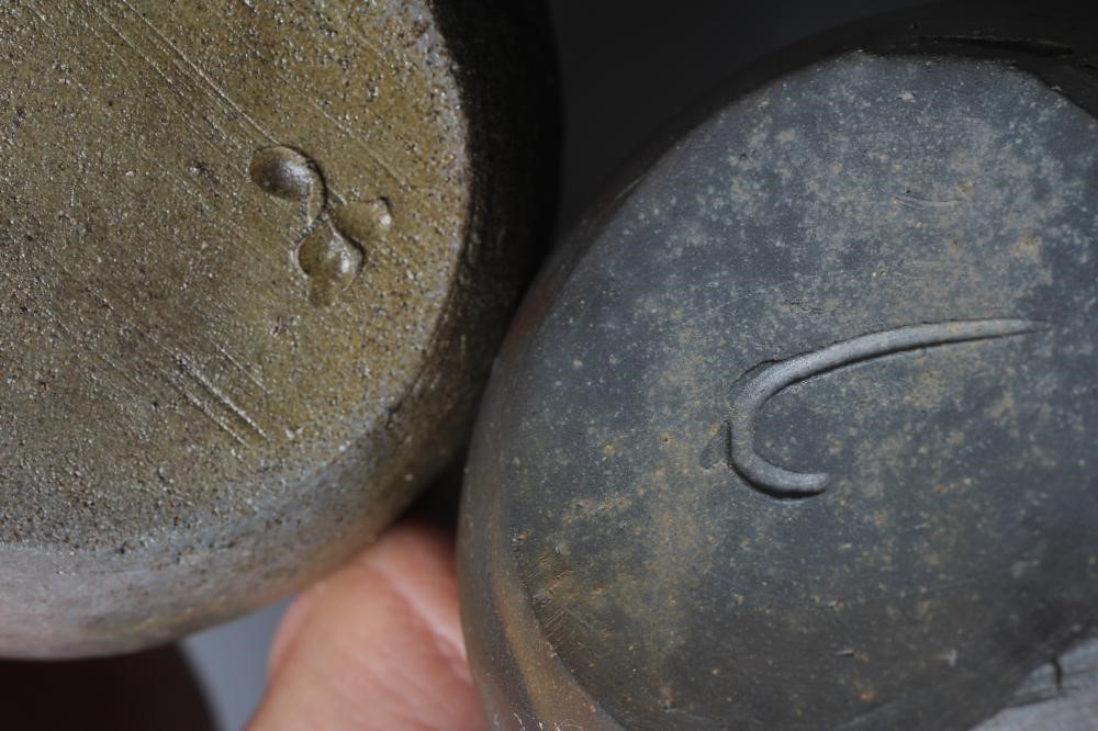 THREE BIZEN STONEWARE TOKKURI, one with a hidasuki firing, various incised marks, one possibly by Image