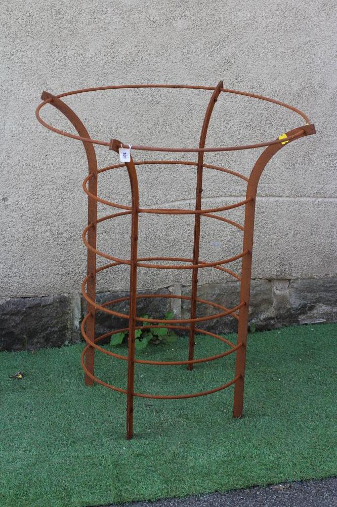 A HAND FORGED CAST IRON TREE GUARD of flared cylindrical form, 33" w x 39" h (Est. plus 24% premium Image