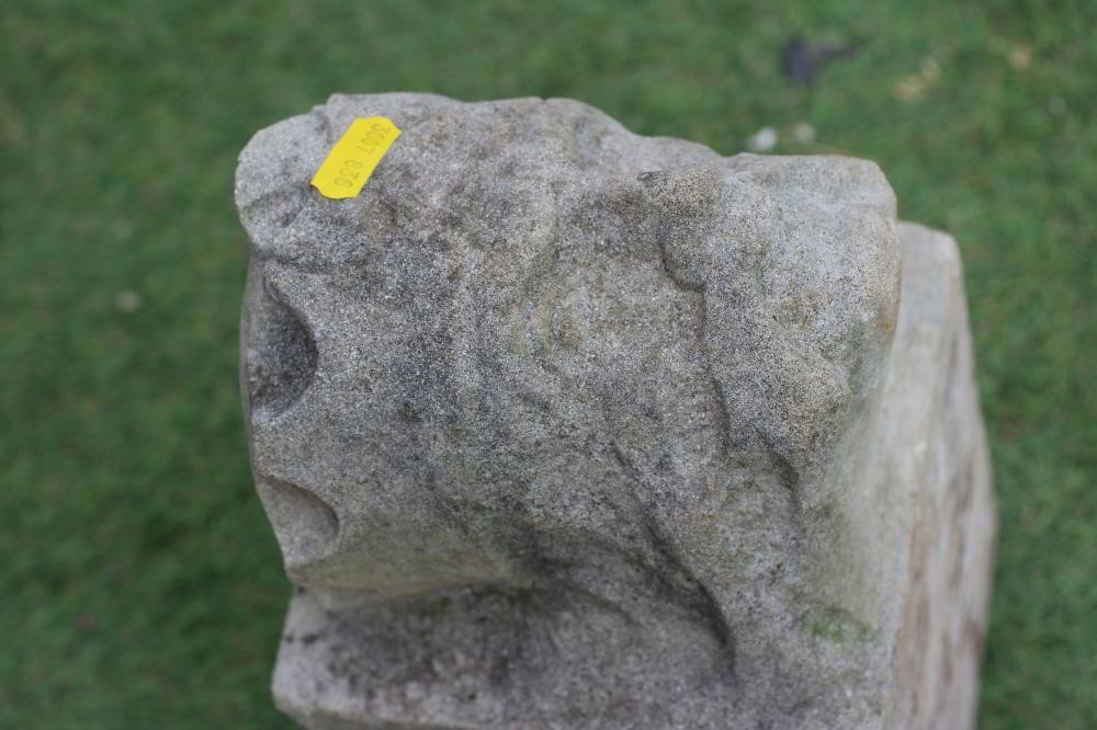 A PAIR OF CAST STONE FIGURAL CORBELS modelled as the heads of a King and Queen, 6" w x 12" d x 6 Image