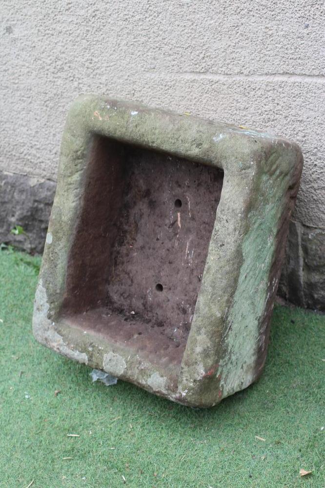 A SANDSTONE TROUGH of well cut oblong form, 29" w x 16 1/2" d x 10" h (Est. plus 24% premium inc. Image