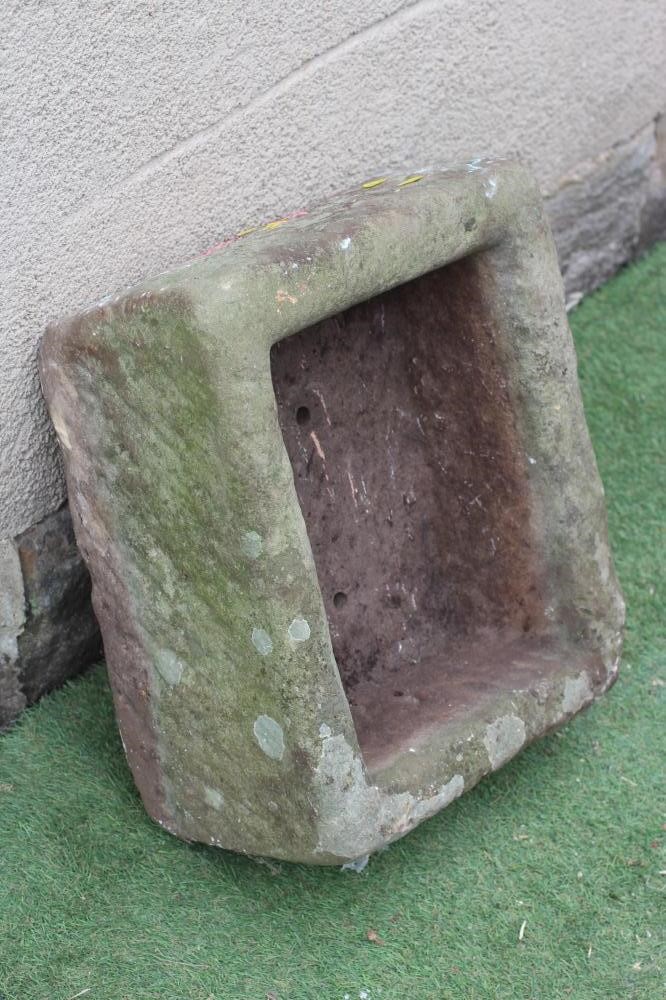 A SANDSTONE TROUGH of well cut oblong form, 29" w x 16 1/2" d x 10" h (Est. plus 24% premium inc. Image