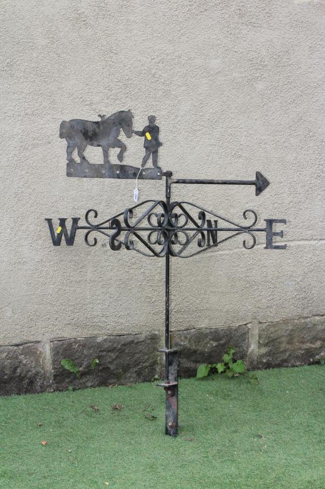 A CAST AND SHEET METAL WEATHER VANE Image