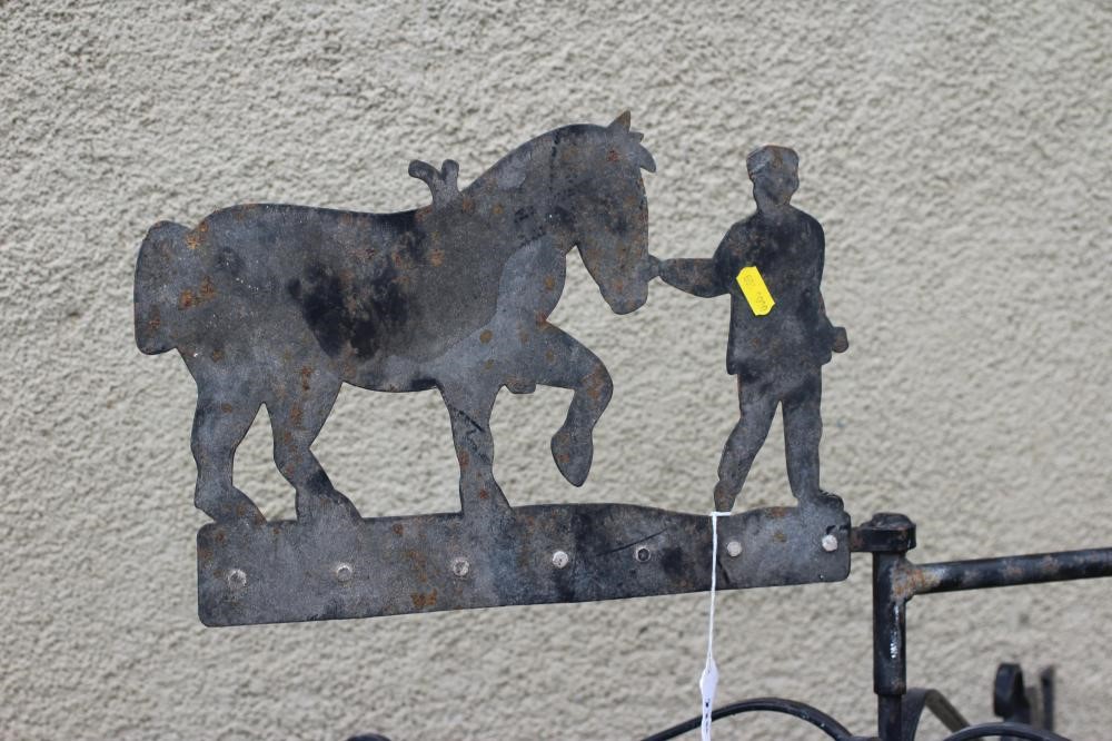 A CAST AND SHEET METAL WEATHER VANE Image