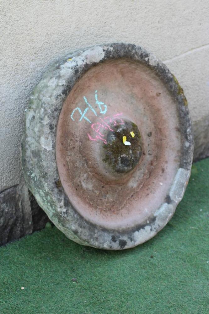 A SANDSTONE PIG TROUGH of well cut circular form with central boss, 28" w x 6" h (Est. plus 24% Image