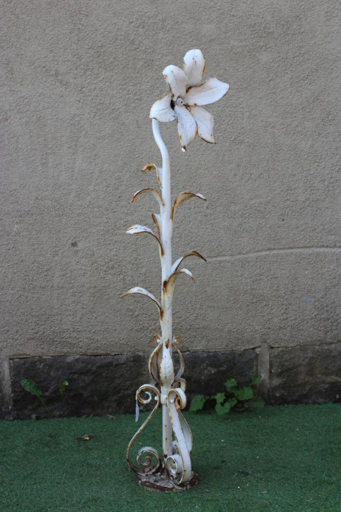 A CAST IRON FOUNTAINHEAD, modelled as a single flowerhead with tubular stem issuing leaves, on Image