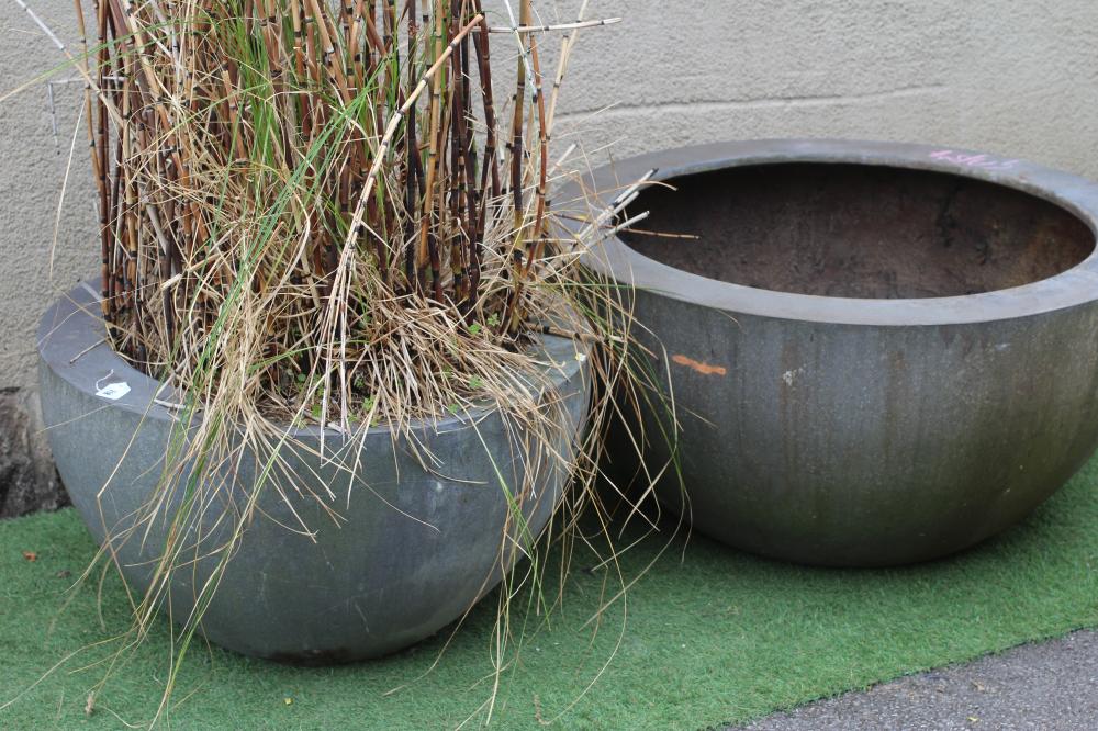 A LARGE COMPOSITION PLANTER of circular tapering form with flat rim, 37 1/4" w x 19" h, together Image