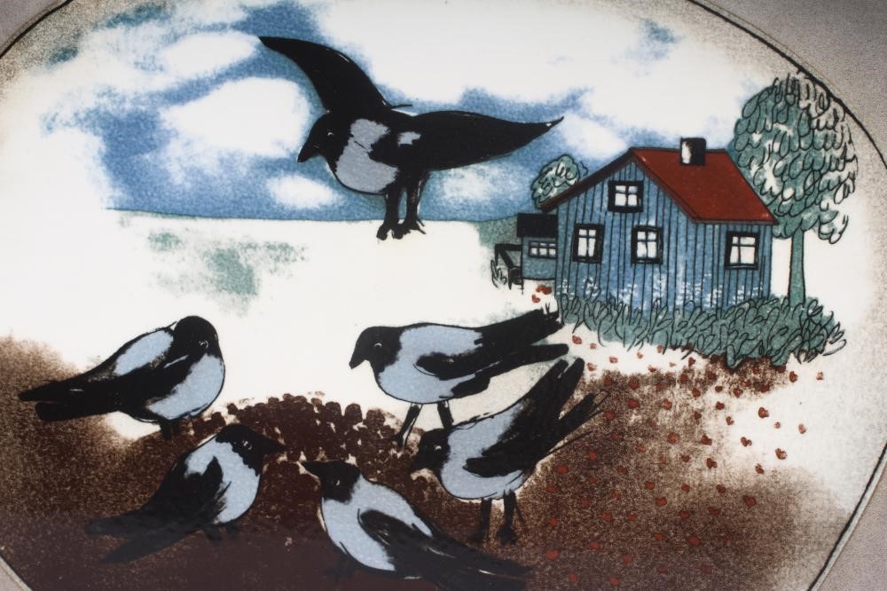 HELJÄ LIUKKO-SUNDSTRÖM FOR ARABIA - An oblong plaque painted with six magpies before a cottage Image