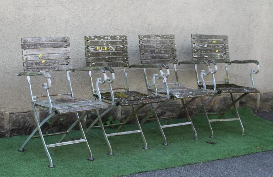 A SET OF FOUR BISTRO FOLDING ARMCHAIRS, the slatted wood seat and back on a metal frame, 22" w x 15 Image