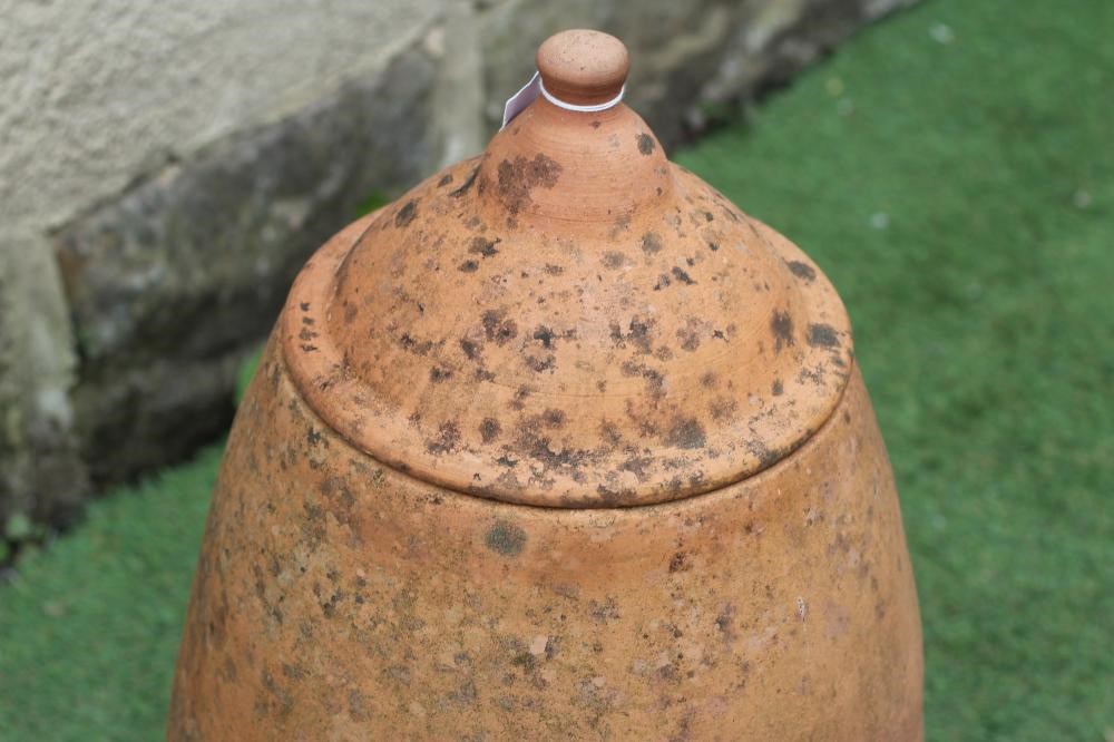 A TERRACOTTA RHUBARB FORCER of tapering form, the domed lid with turned knop, 16" w x 26" h Image