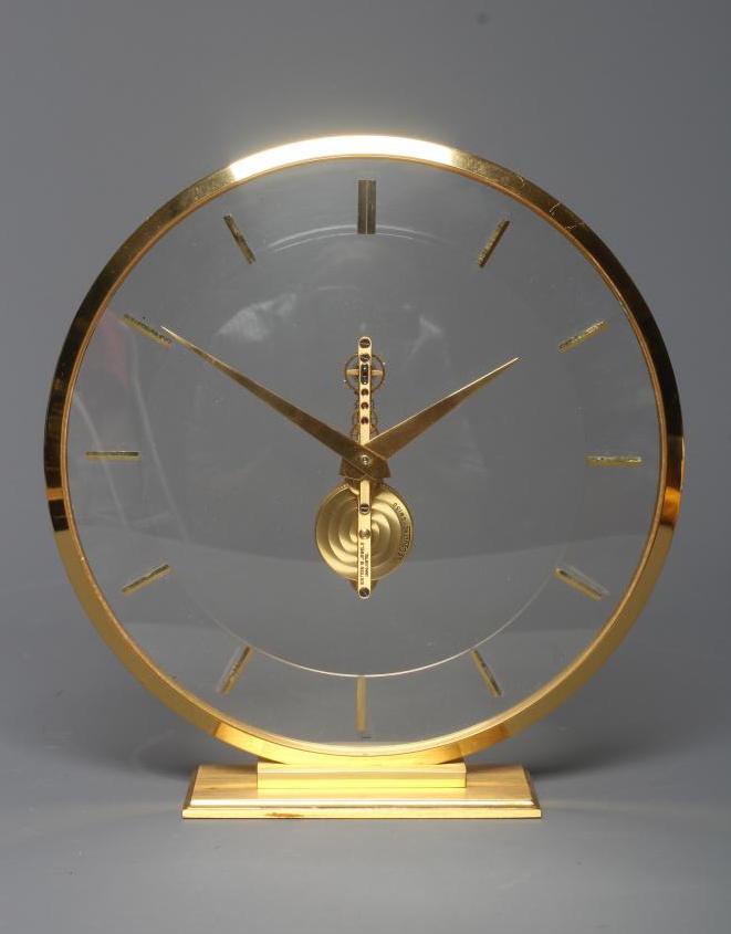 A JAEGER-LECOULTRE GILT BRASS MANTEL CLOCK Image