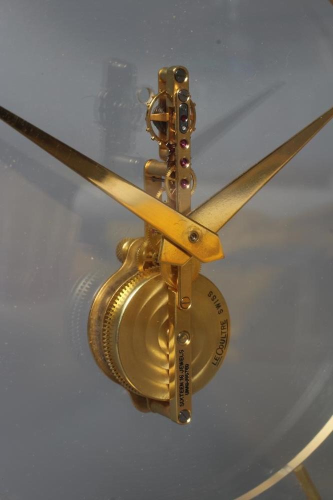 A JAEGER-LECOULTRE GILT BRASS MANTEL CLOCK Image