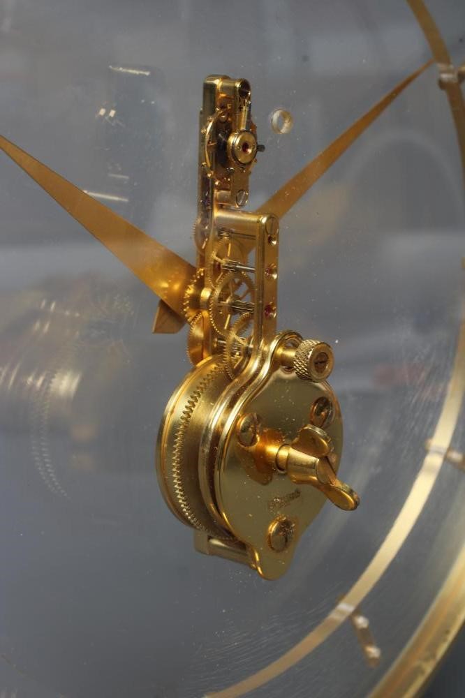 A JAEGER-LECOULTRE GILT BRASS MANTEL CLOCK Image