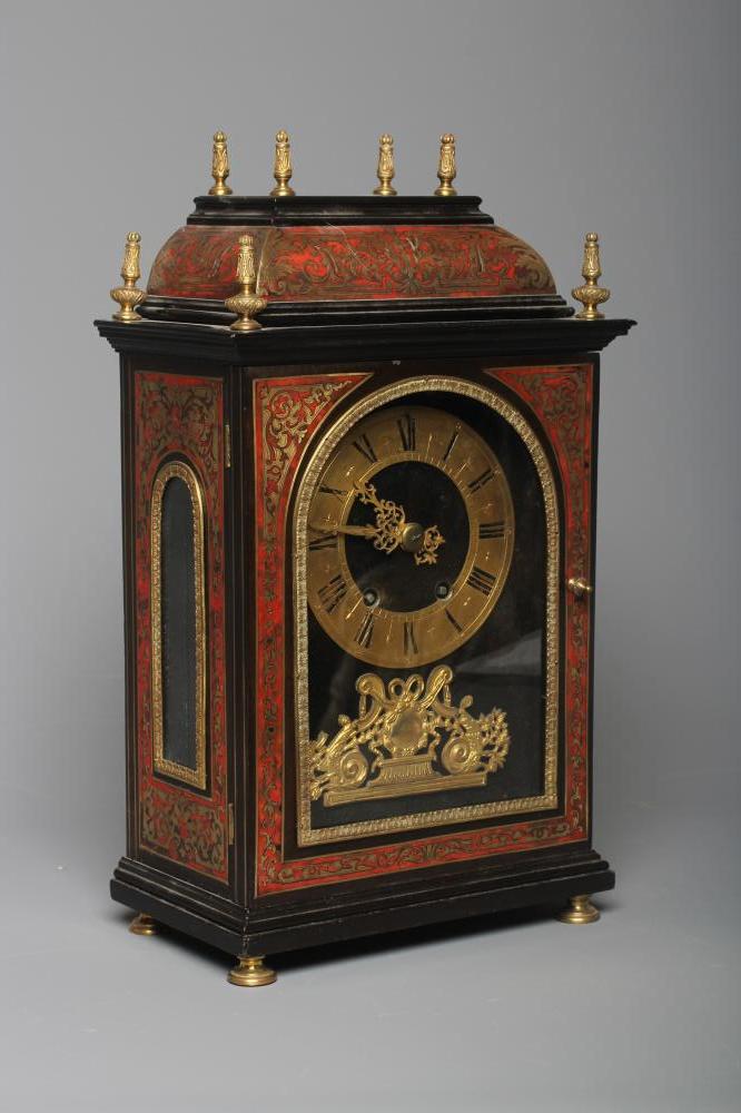 AN EBONISED MANTEL CLOCK Image