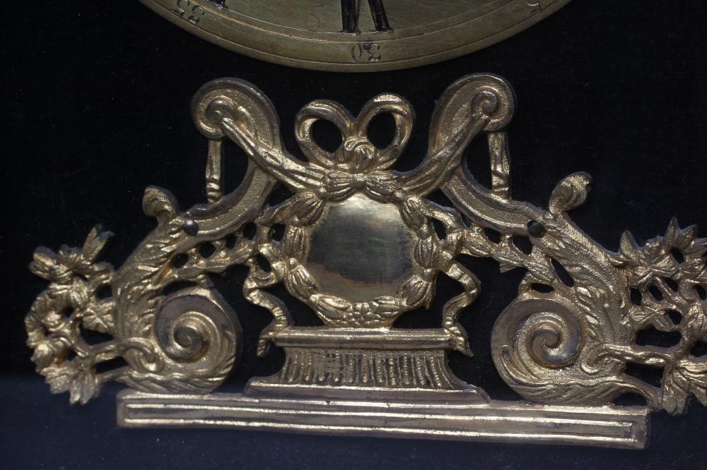 AN EBONISED MANTEL CLOCK Image