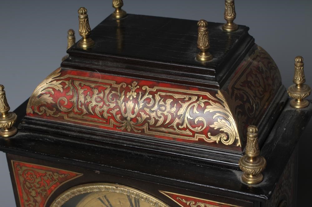 AN EBONISED MANTEL CLOCK Image