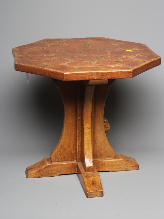 ROBERT THOMPSON - AN ADZED OAK OCTAGONAL COFFEE TABLE, the waisted cruciform stem with square sledge Image