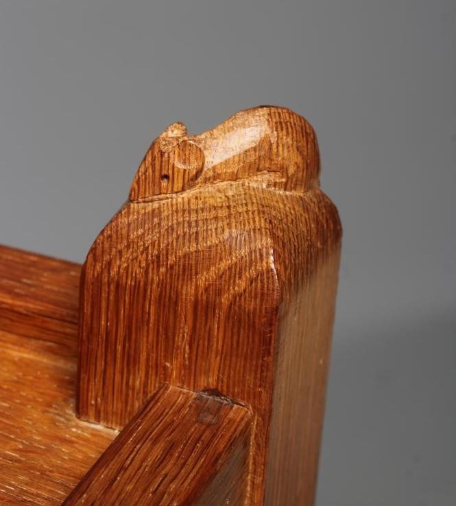 ROBERT THOMPSON - AN OAK TWO TIER OBLONG TEA TROLLEY with square supports and castors, carved mouse Image