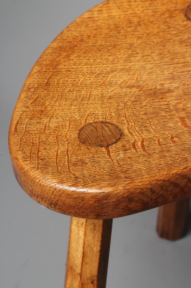 ROBERT THOMPSON - AN ADZED OAK STOOL Image