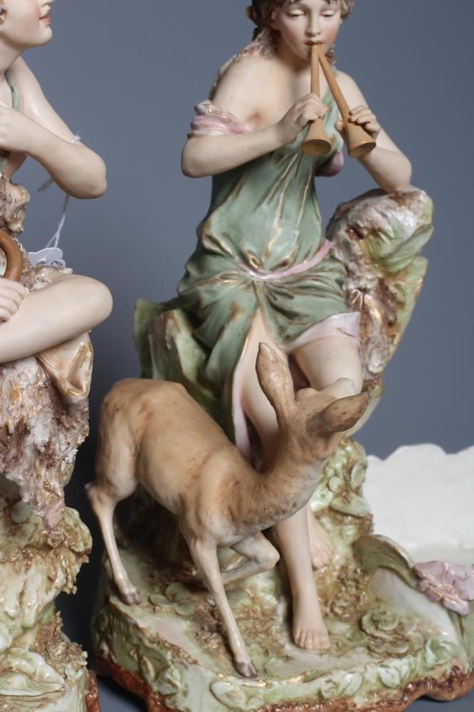 A MATCHED PAIR OF ROYAL DUX PORCELAIN FIGURAL CENTRE BOWLS Image