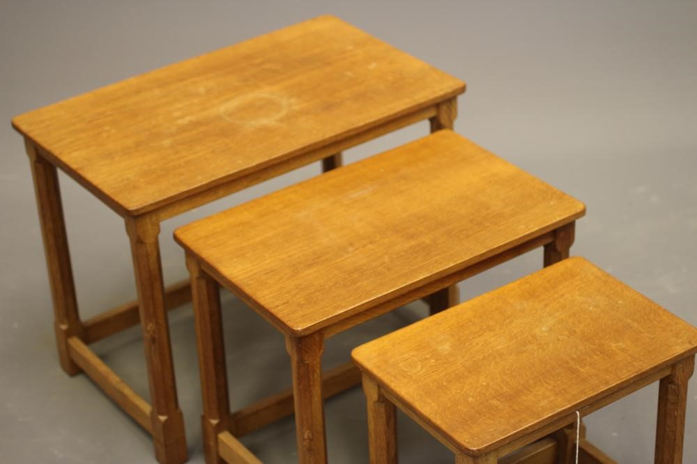ROBERT THOMPSON - AN ADZED OAK NEST OF THREE TABLES Image