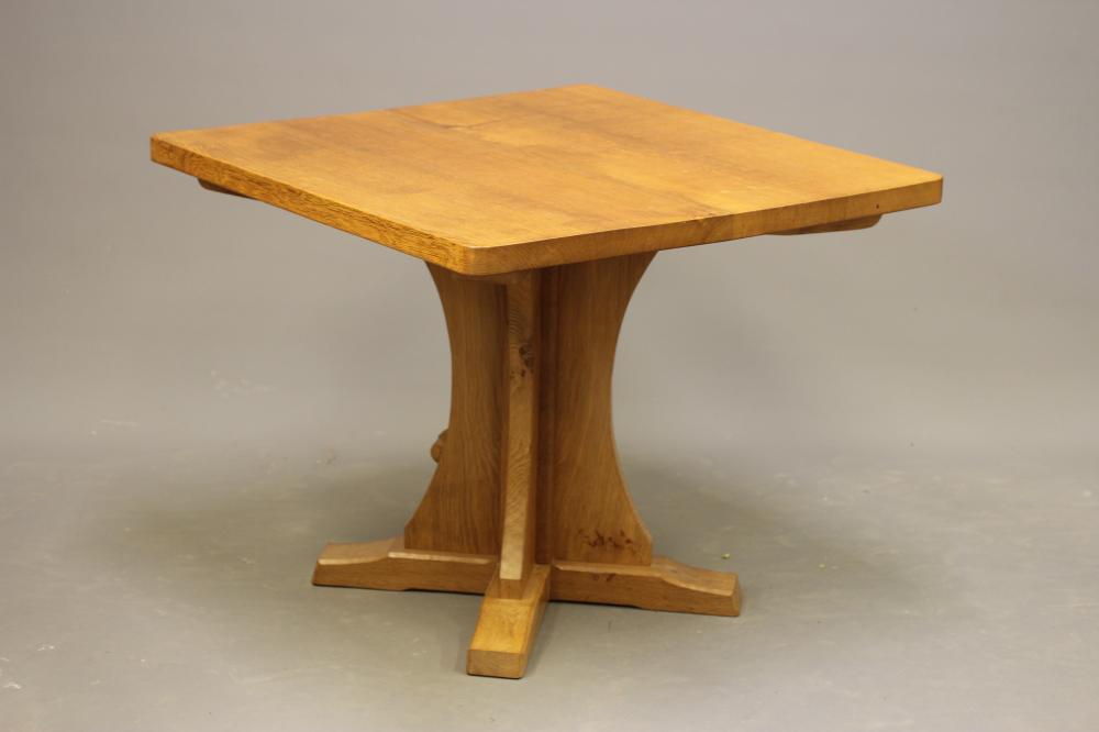 ROBERT THOMPSON - AN ADZED OAK DINING TABLE Image