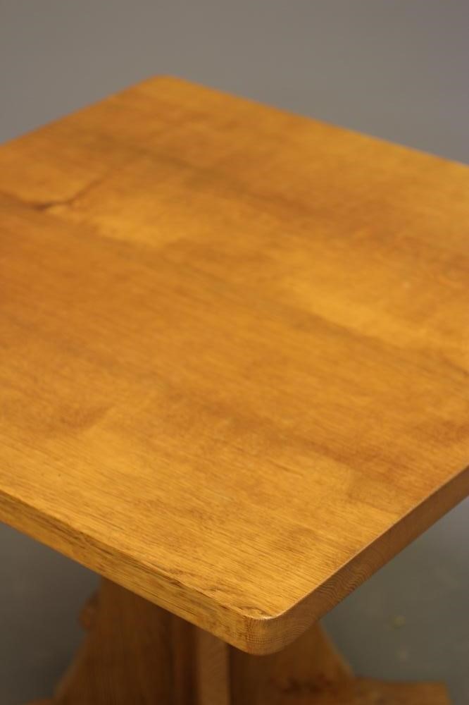 ROBERT THOMPSON - AN ADZED OAK DINING TABLE Image