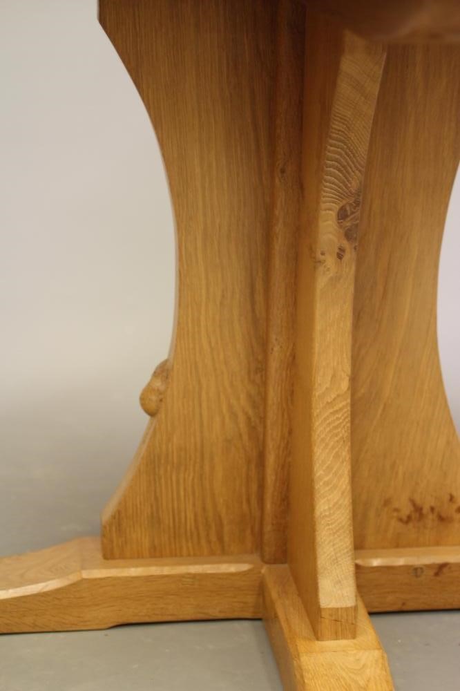 ROBERT THOMPSON - AN ADZED OAK DINING TABLE Image