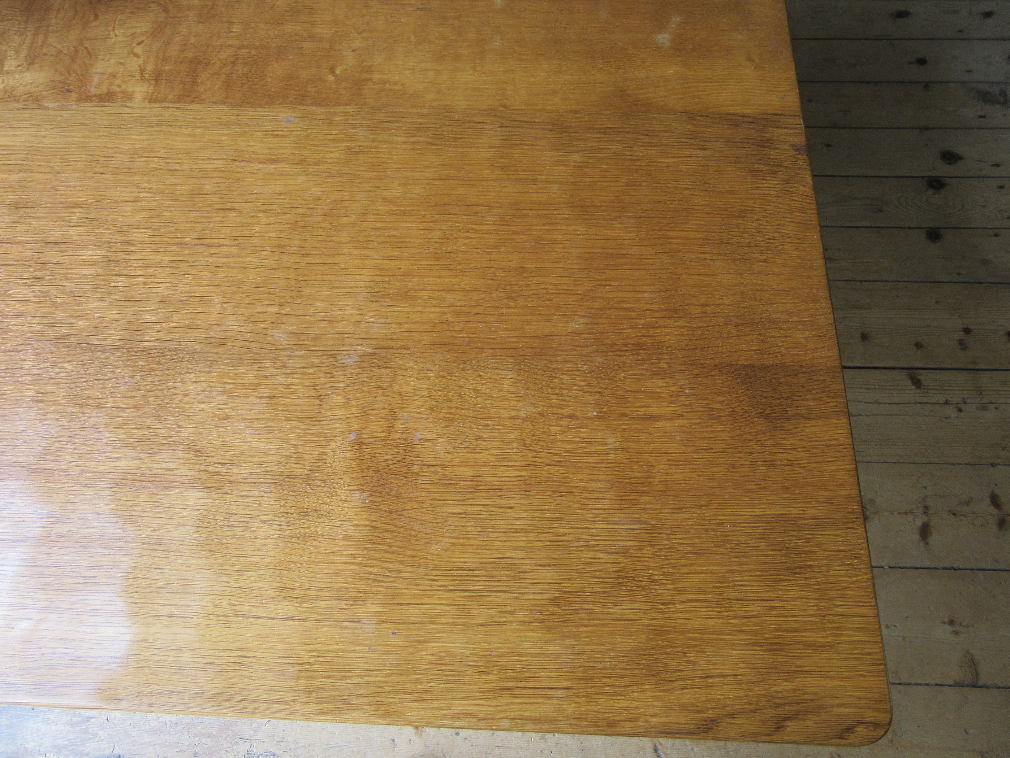 ROBERT THOMPSON - AN ADZED OAK DINING TABLE Image