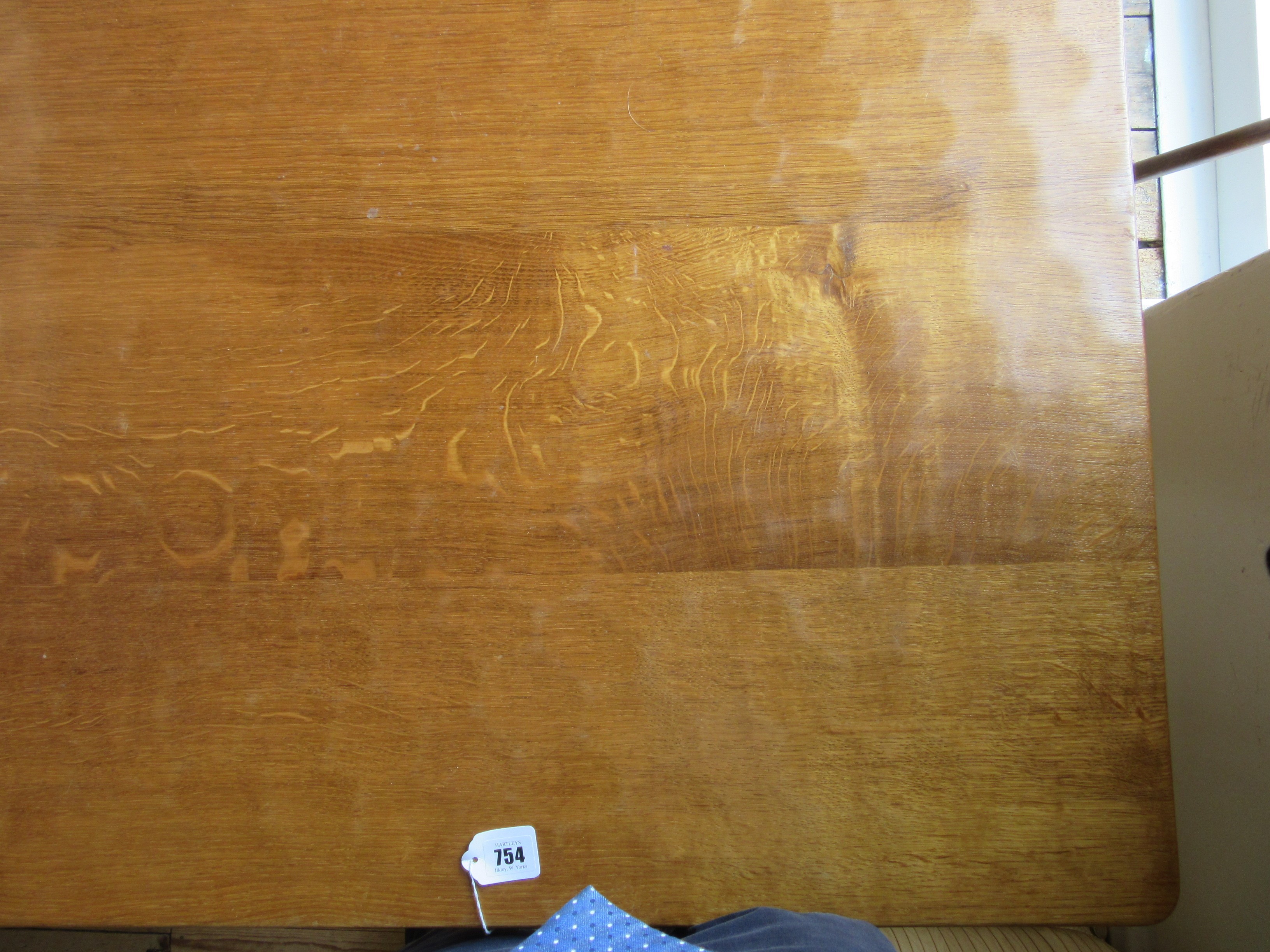 ROBERT THOMPSON - AN ADZED OAK DINING TABLE Image