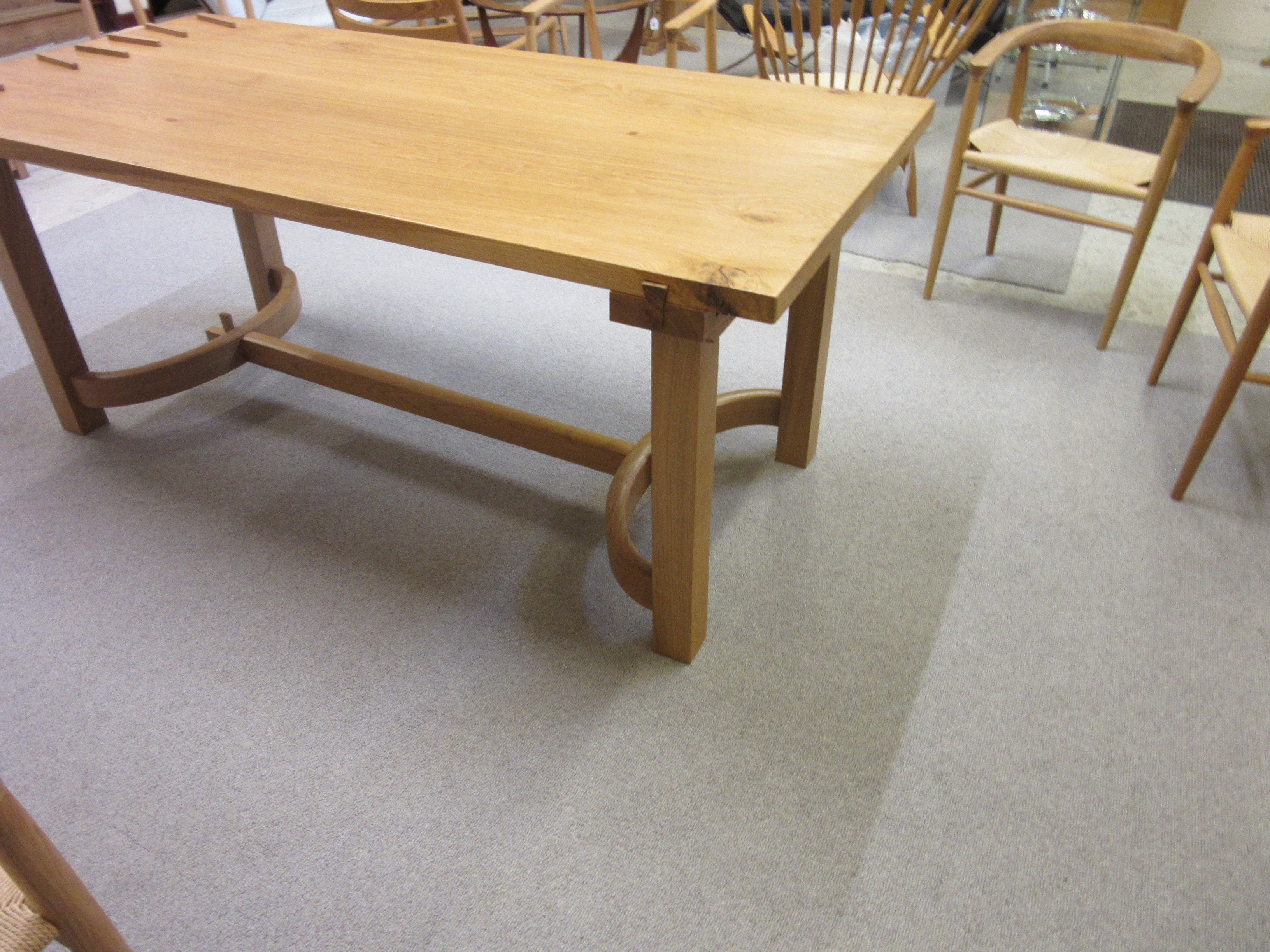 MARCUS JACKA NON STANDARD STUDIO THIRSK - AN ORBITT OAK DINING TABLE Image