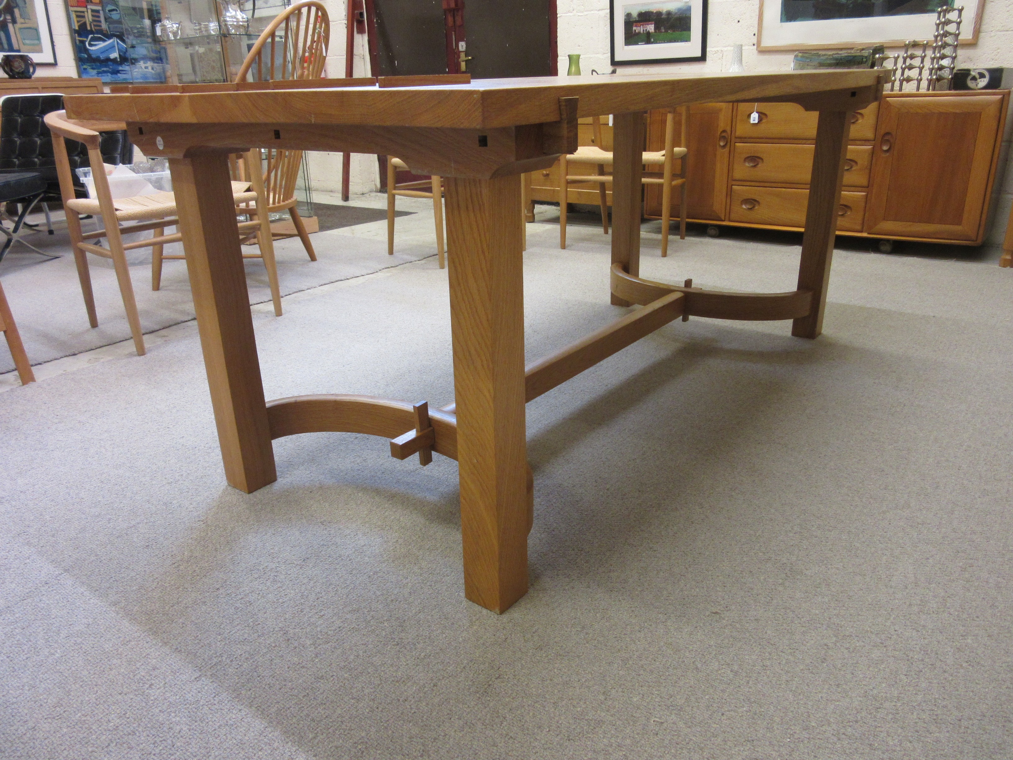 MARCUS JACKA NON STANDARD STUDIO THIRSK - AN ORBITT OAK DINING TABLE Image