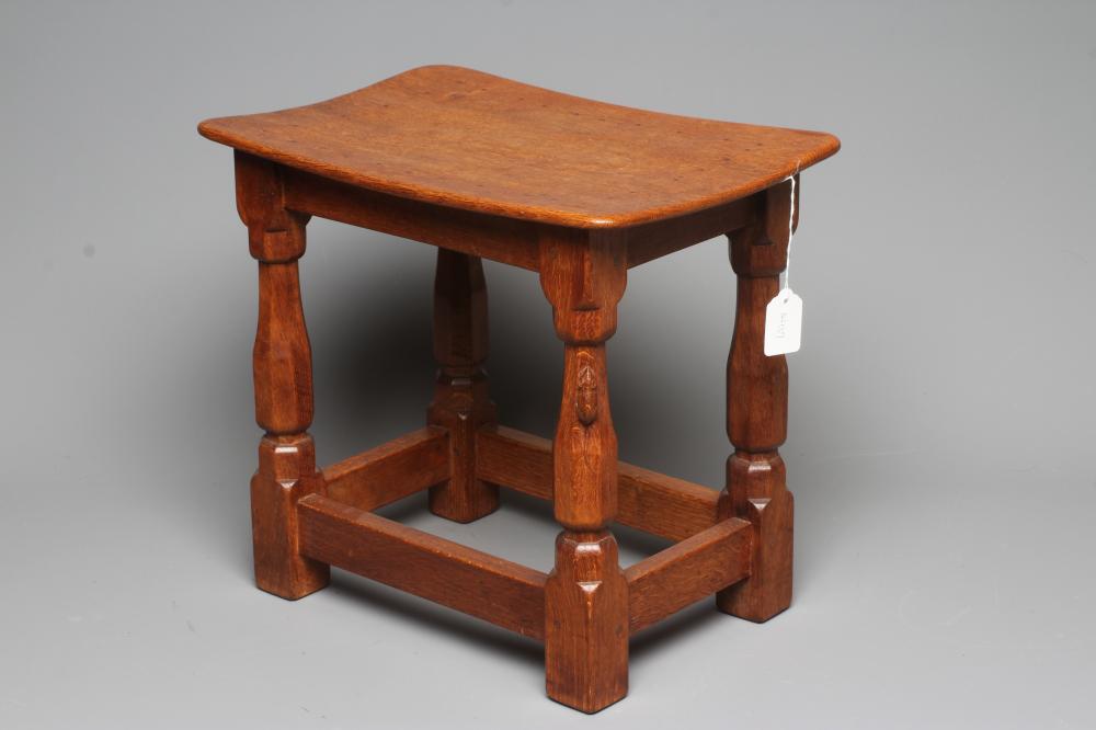 ROBERT THOMPSON - AN ADZED OAK STOOL Image
