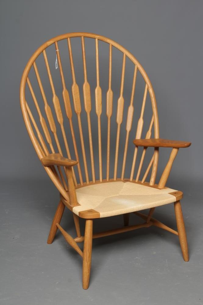AFTER HANS WEGNER (Danish 1914-2007) - A PEACOCK CHAIR, model JH550, modern, in ash and beech with Image