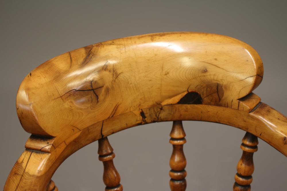A PAIR OF VICTORIAN YEW WOOD SMOKER'S BOW ARMCHAIRS Image