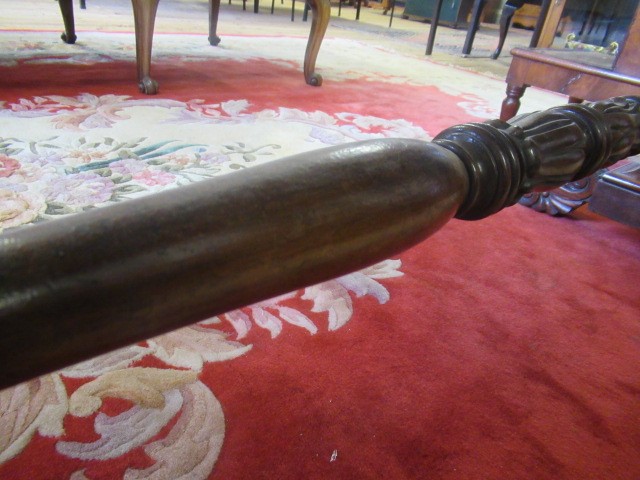 A REGENCY ROSEWOOD PILLAR END LIBRARY TABLE Image